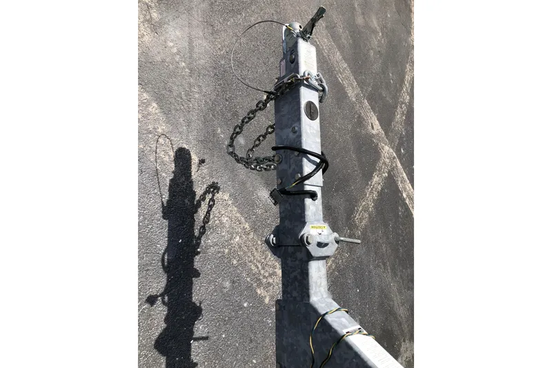 Slide: The Image of Trailer hitch of a 2008 Regal 2000 Bowrider on asphalt surface. - 21