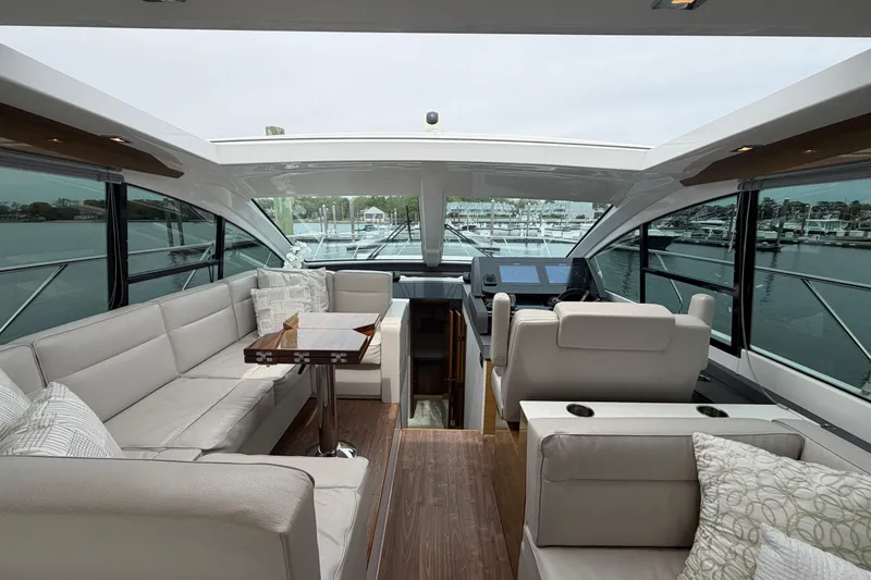 Slide: The Image of Luxurious interior of 2018 Cruisers Yachts 50 Cantius with elegant seating and helm. - 13