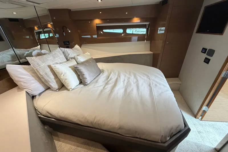 Slide: The Image of Luxurious bedroom interior of 2018 Cruisers Yachts 50 Cantius with elegant bedding. - 26