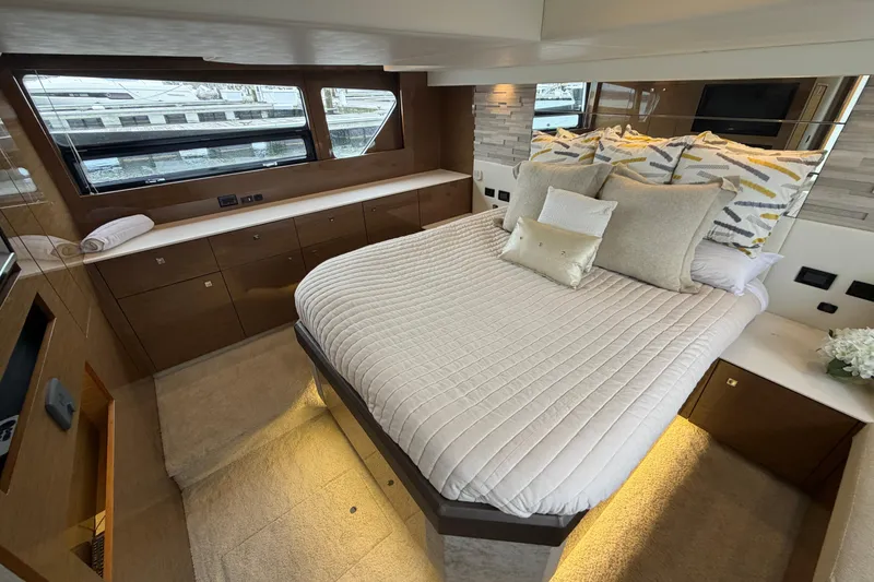 Slide: The Image of Luxurious bedroom interior of 2018 Cruisers Yachts 50 Cantius with elegant bedding and modern design. - 36