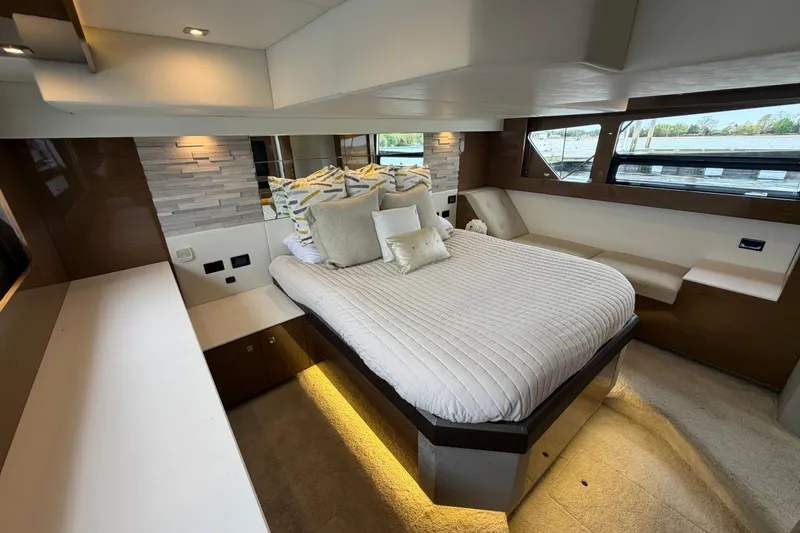 Slide: The Image of Luxurious bedroom interior of 2018 Cruisers Yachts 50 Cantius with modern design and ambient lighting. - 40