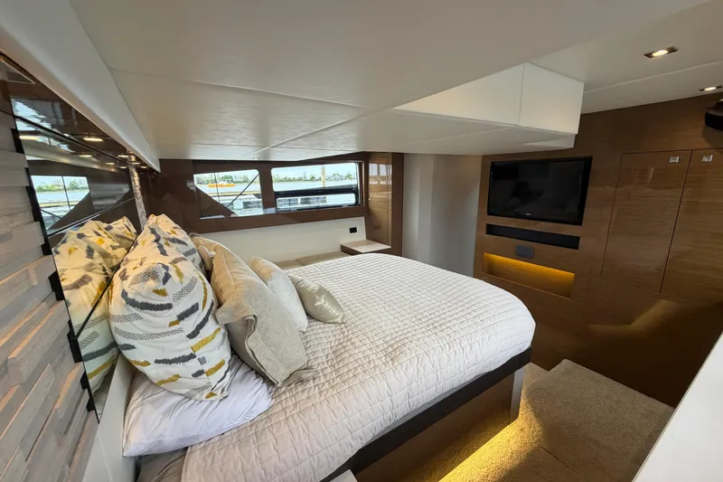 Slide: The Image of Luxurious bedroom interior of 2018 Cruisers Yachts 50 Cantius with modern design and large windows. - 42