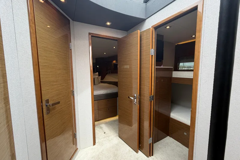 Slide: The Image of Interior view of 2018 Cruisers Yachts 50 Cantius with wooden doors and cozy cabins. - 46