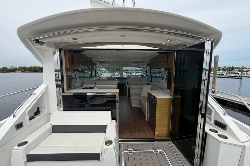 Slide: The Image of 2018 Cruisers Yachts 50 Cantius interior view, featuring luxurious seating and modern design. - 5