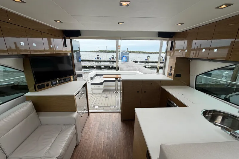 Slide: The Image of Luxurious interior of 2018 Cruisers Yachts 50 Cantius with modern amenities and waterfront view. - 51