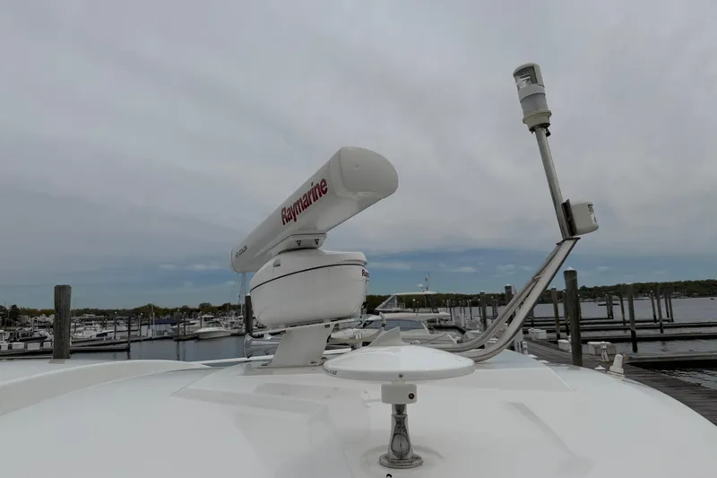 Slide: The Image of Radar equipment on 2018 Cruisers Yachts 50 Cantius at marina dock. - 53