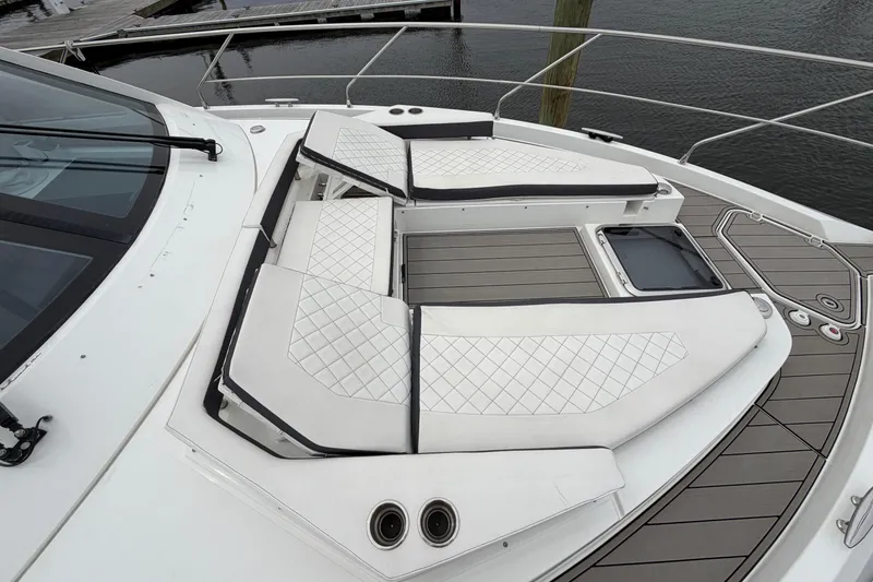 Slide: The Image of Luxurious 2018 Cruisers Yachts 50 Cantius deck with elegant seating and sleek design. - 60