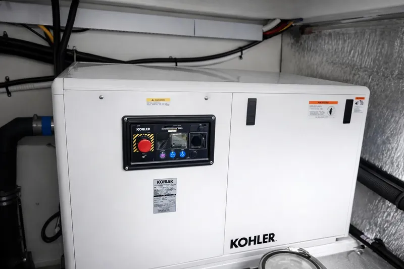 Slide: The Image of Kohler generator in 2018 Cruisers Yachts 50 Cantius engine room. - 65