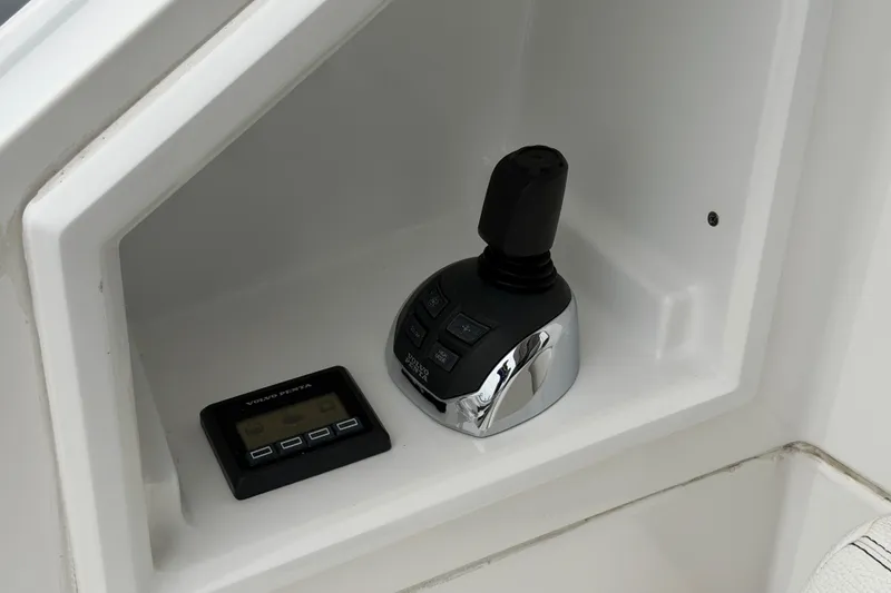 Slide: The Image of Control panel of 2018 Cruisers Yachts 50 Cantius with joystick and display. - 9