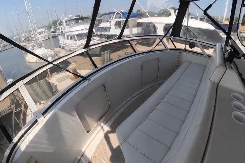 Slide: The Image of Interior view of 2000 Carver 406 Motor Yacht with marina backdrop. - 27