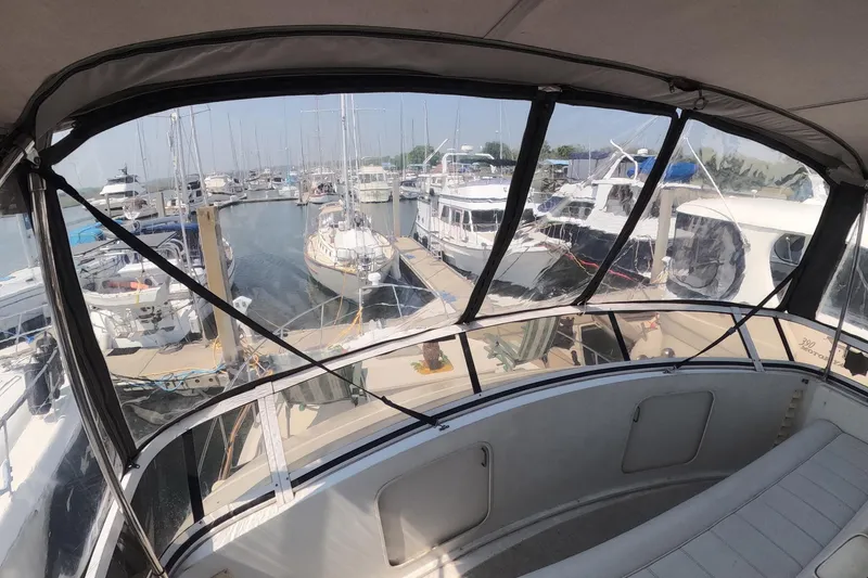 Slide: The Image of View from 2000 Carver 406 Motor Yacht overlooking marina with docked boats. - 29