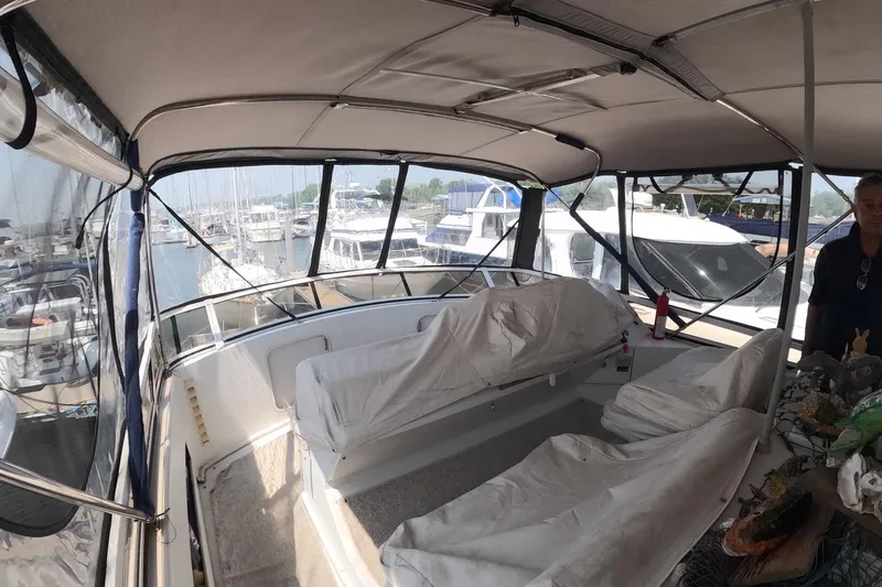 Slide: The Image of Interior view of a 2000 Carver 406 Motor Yacht at a marina. - 30