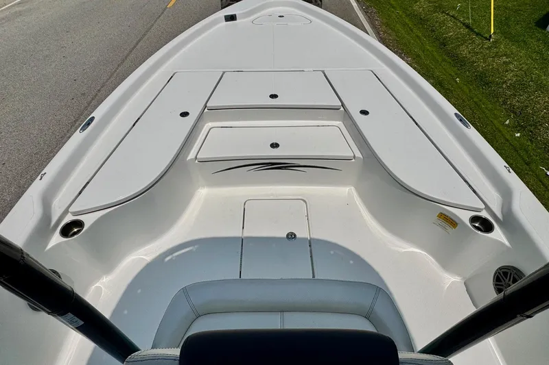 Slide: The Image of 2017 Blue Wave 2400 PureBay boat deck with storage compartments and seating. - 13