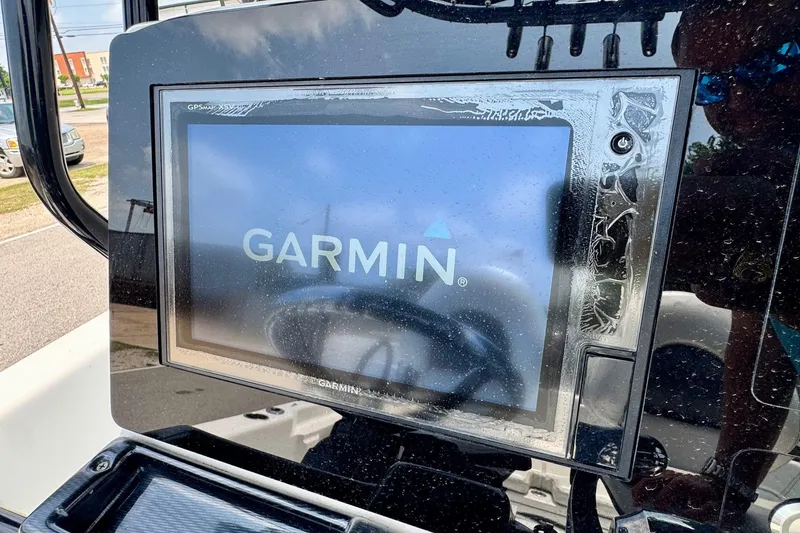 Slide: The Image of Garmin GPS display on 2017 Blue Wave 2400 PureBay boat dashboard. - 16