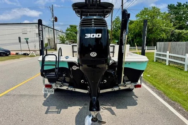 Slide: The Image of 2017 Blue Wave 2400 PureBay boat with powerful 300 HP engine on trailer. - 3