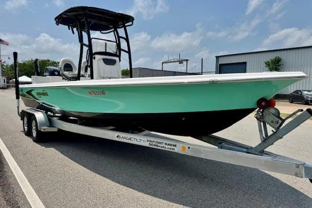 Slide: The Image of 2017 Blue Wave 2400 PureBay boat on trailer, parked outdoors. - 5