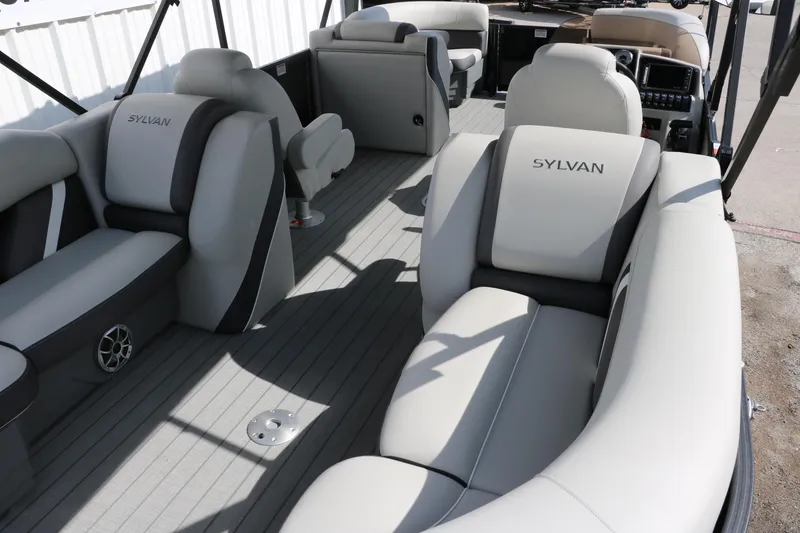 Slide: The Image of 2025 Sylvan Mirage X3 boat interior with luxurious seating and modern design. - 19