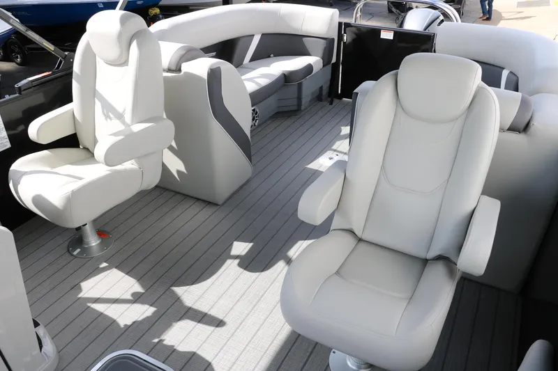 Slide: The Image of 2025 Sylvan Mirage X3 boat interior with plush seating and modern design. - 26