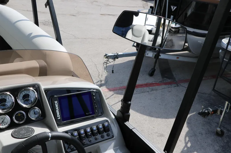 Slide: The Image of Interior view of 2025 Sylvan Mirage X3 boat dashboard with navigation system. - 31