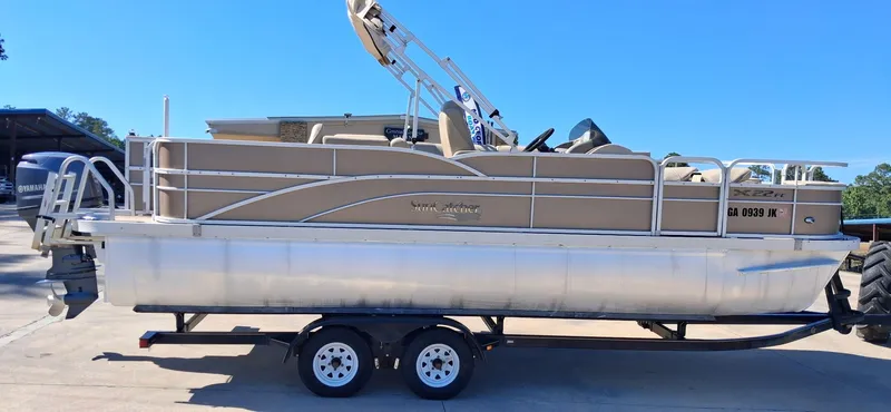 The Image of 2013 SunCatcher X22 FC pontoon boat on trailer. - 0