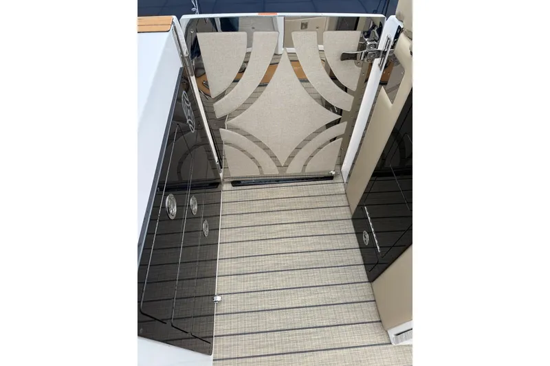 Slide: The Image of Modern interior of Balise Helix 26 L yacht, featuring sleek design and patterned flooring, 2025 model. - 12