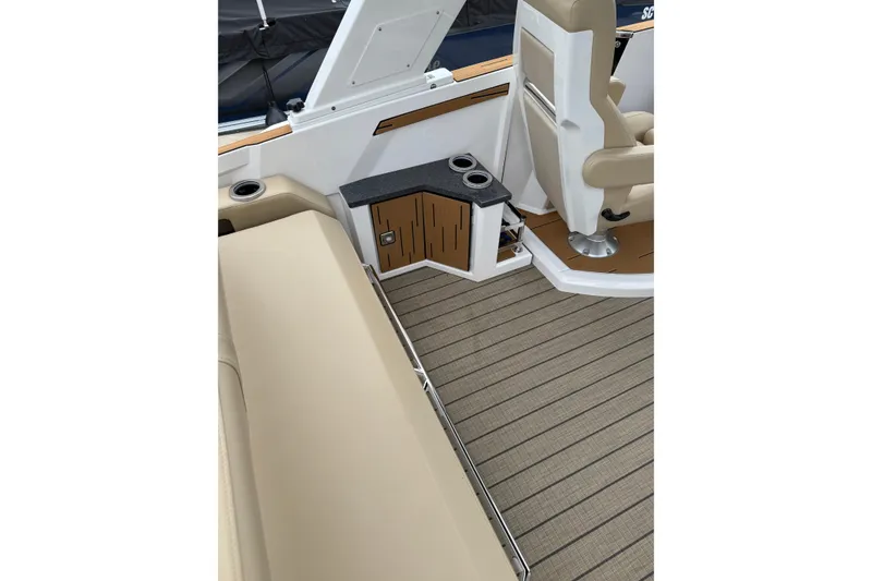 Slide: The Image of Luxurious interior of 2025 Balise Helix 26 L boat with beige seating and wood accents. - 22