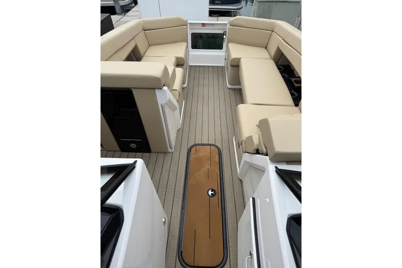 Slide: The Image of Luxurious interior of 2025 Balise Helix 26 L boat with beige seating and sleek design. - 28