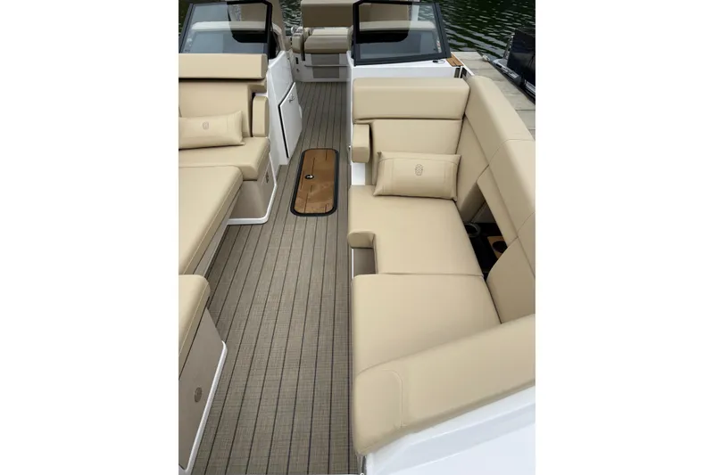 Slide: The Image of Luxurious interior of 2025 Balise Helix 26 L boat with beige seating and sleek design. - 30