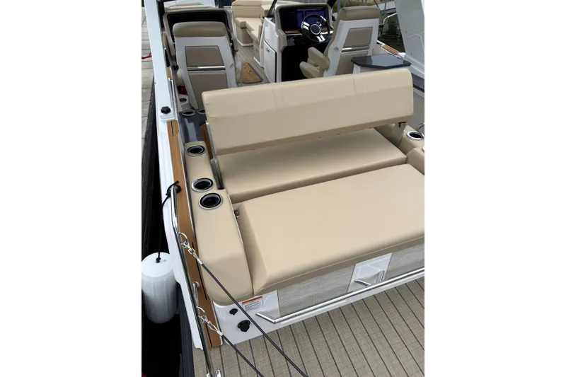 Slide: The Image of Luxurious seating on 2025 Balise Helix 26 L boat with cup holders and modern design. - 5
