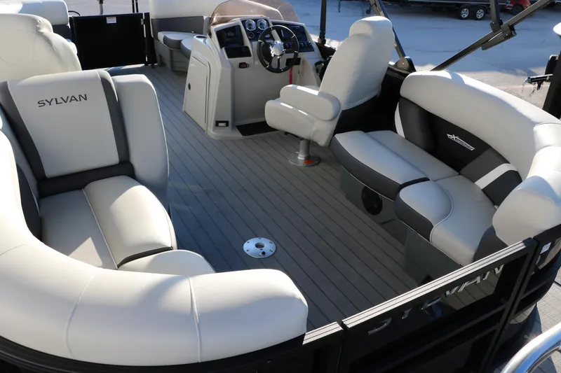 Slide: The Image of Interior of 2025 Sylvan Mirage X1 pontoon boat with luxurious seating and modern helm. - 19