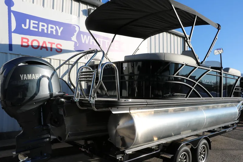 Slide: The Image of 2025 Sylvan Mirage X1 pontoon boat with Yamaha engine at Jerry Boats dealership. - 3