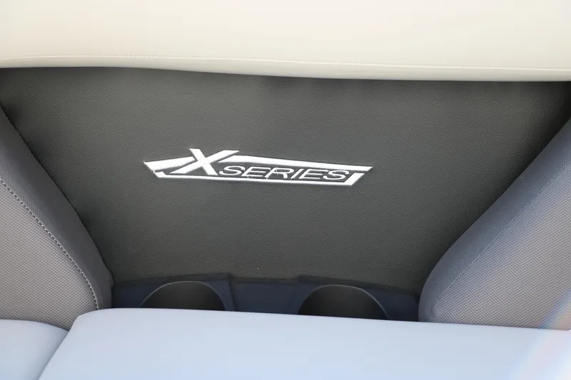 Slide: The Image of 2025 Sylvan Mirage X1 interior with X Series logo on seat back. - 24