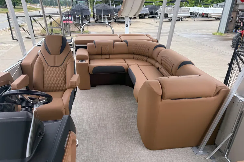 Slide: The Image of Luxurious interior of 2026 Avalon Catalina Cruise Funship, featuring plush tan seating and modern design. - 13