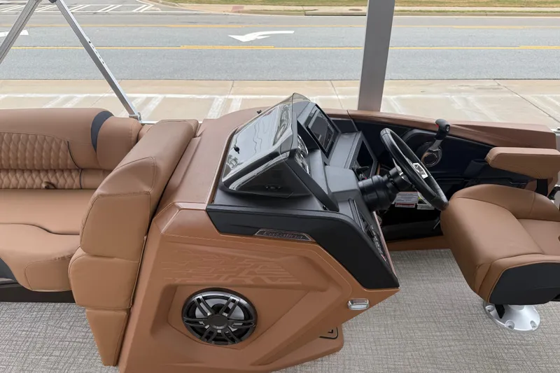 Slide: The Image of Interior of 2026 Avalon Catalina Cruise Funship, featuring luxurious tan seating and modern dashboard. - 15