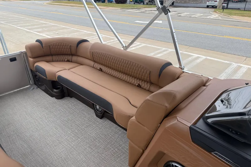 Slide: The Image of Luxurious seating on 2026 Avalon Catalina Cruise Funship, featuring plush brown upholstery. - 16