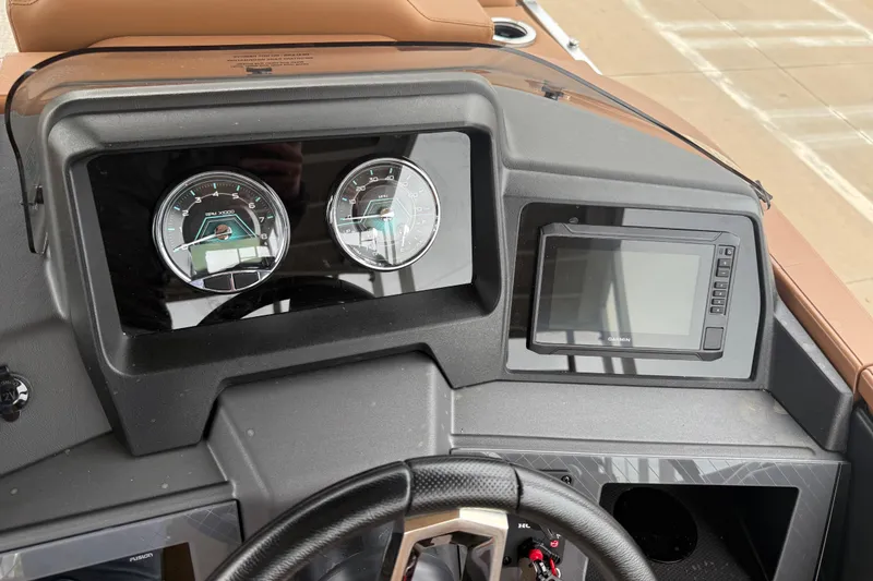 Slide: The Image of Dashboard of 2026 Avalon Catalina Cruise Funship with gauges and navigation screen. - 19