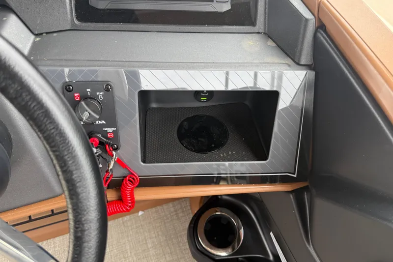 Slide: The Image of Control panel of 2026 Avalon Catalina Cruise Funship with ignition and USB port. - 22