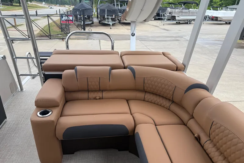 Slide: The Image of Luxurious seating on 2026 Avalon Catalina Cruise Funship, featuring plush brown upholstery. - 26