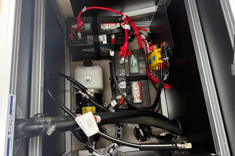 Slide: The Image of Battery compartment of 2026 Avalon Catalina Cruise Funship, featuring wiring and components. - 31