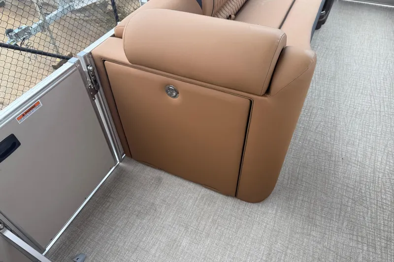 Slide: The Image of Tan seating on 2026 Avalon Catalina Cruise Funship boat, featuring sleek design and storage compartment. - 39