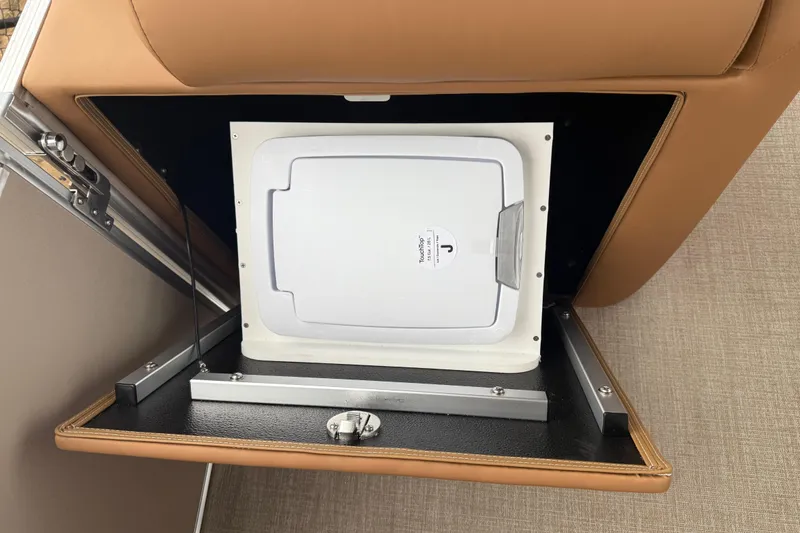 Slide: The Image of Storage compartment in 2026 Avalon Catalina Cruise Funship boat, featuring a secure latch mechanism. - 40