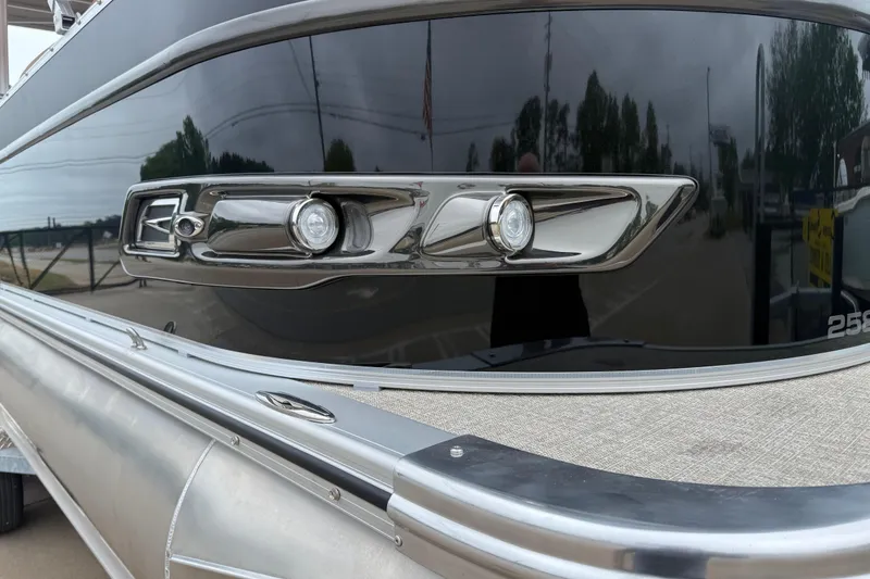 Slide: The Image of 2026 Avalon Catalina Cruise Funship 25' with sleek chrome detailing and modern design. - 5