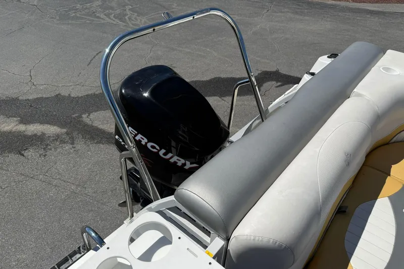 Slide: The Image of 2011 JC NEPTOON SPORT 21TT boat with Mercury outboard motor and cushioned seating. - 18