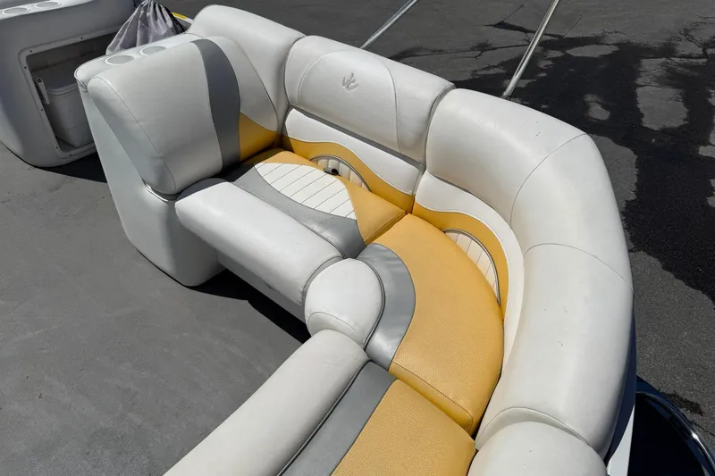 Slide: The Image of 2011 JC NEPTOON SPORT 21TT boat seating with white, yellow, and gray upholstery. - 8