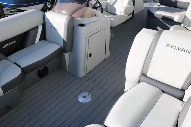 Slide: The Image of 2025 Sylvan Mirage X X1 CLZ DH boat interior with sleek seating and modern design. - 15