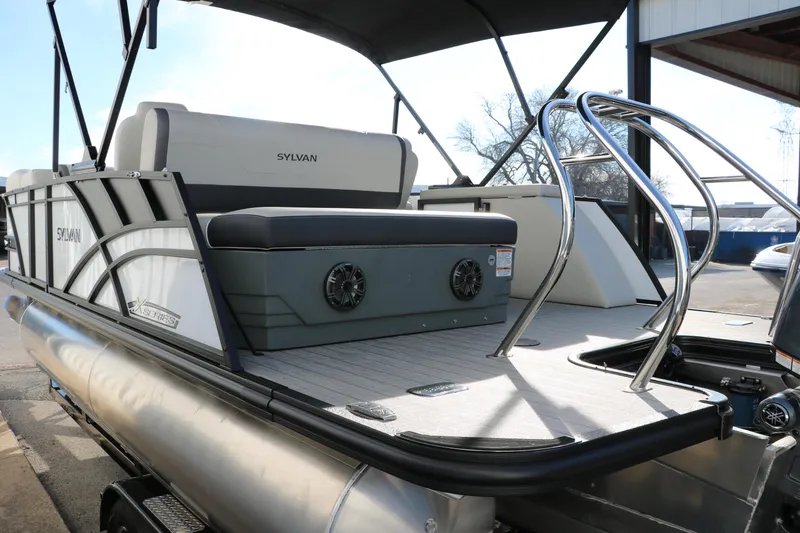 Slide: The Image of 2025 Sylvan Mirage X X1 CLZ DH pontoon boat with sleek seating and modern design. - 9
