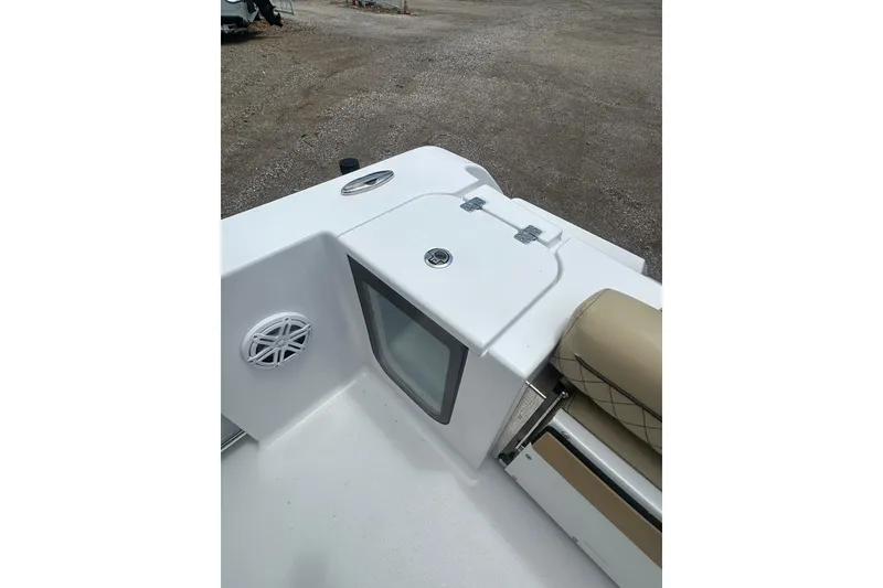 Slide: The Image of 2026 Sportsman Open 232 Center Console boat interior with seating and storage. - 13