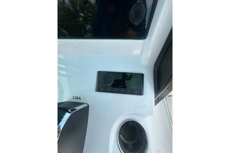 Slide: The Image of Control panel on 2026 Sportsman Open 232 Center Console boat dashboard. - 22