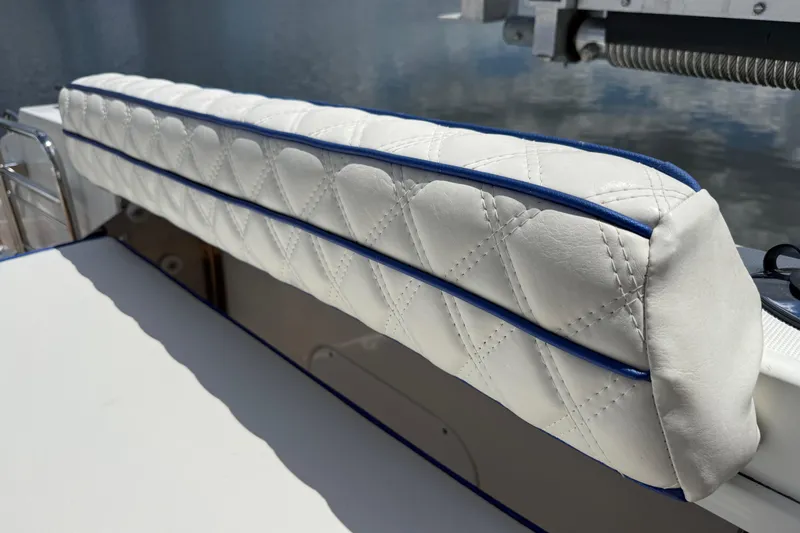 Slide: The Image of White quilted cushion detail on 2019 Jeanneau Leader 10.5 boat. - 33