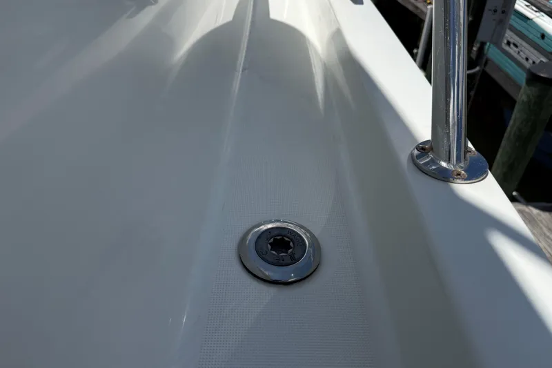 Slide: The Image of 2019 Jeanneau Leader 10.5 deck detail with stainless steel fittings. - 50